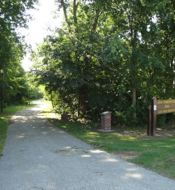 Packers Heritage Trial marker for the Practice Field.  Shows a walking path and trees. 